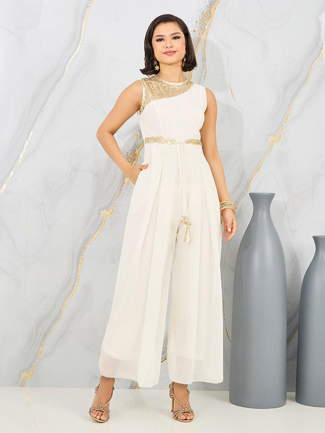 Women's Off-White Solid Relaxed Fit Sleeveless Round-Neck Ankle-Length Straight Jumpsuit