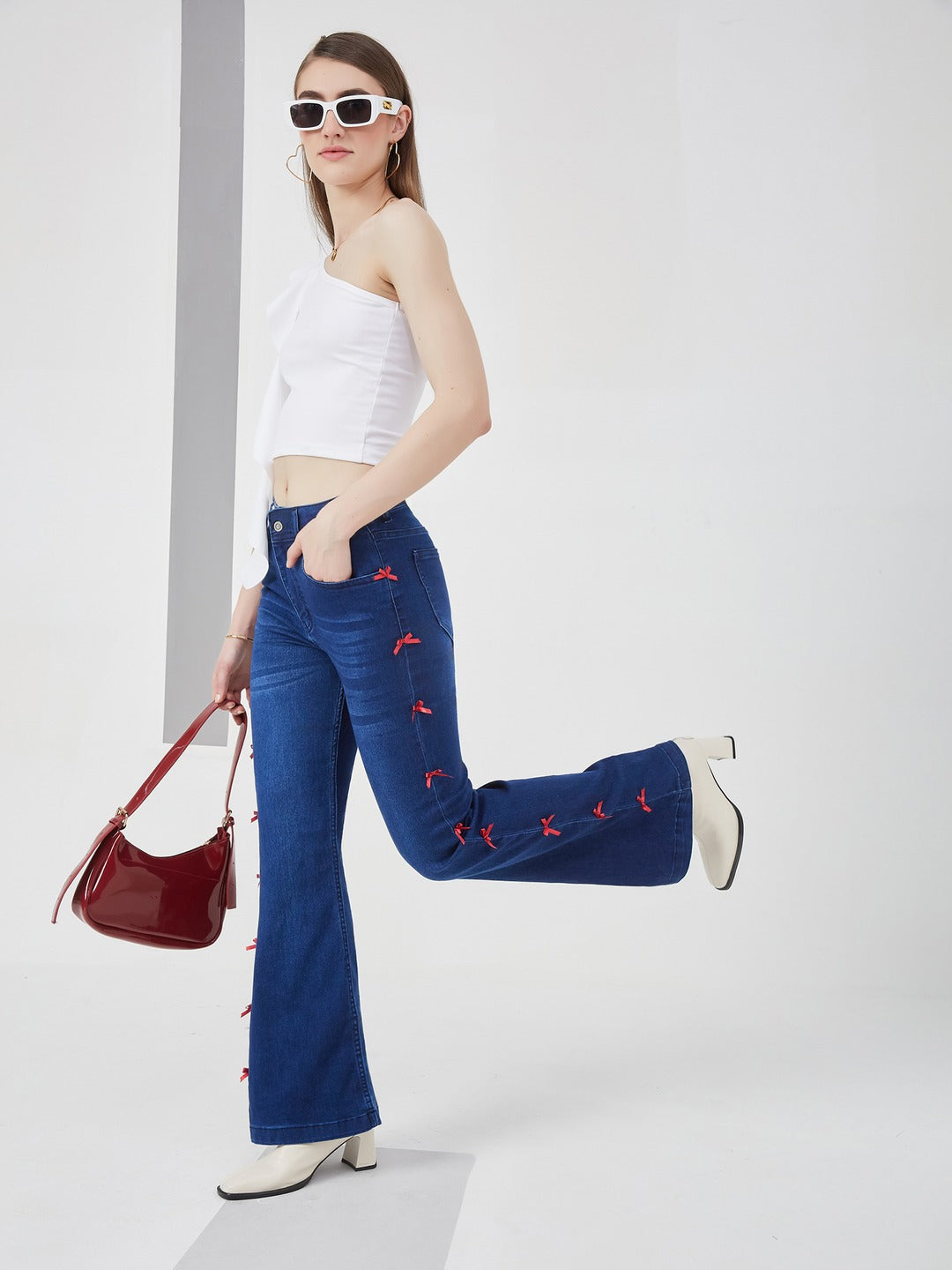Navy Blue High-Rise dark red satin bows stitched along side seams , Stretchable Bootcut Denim Jeans for Women