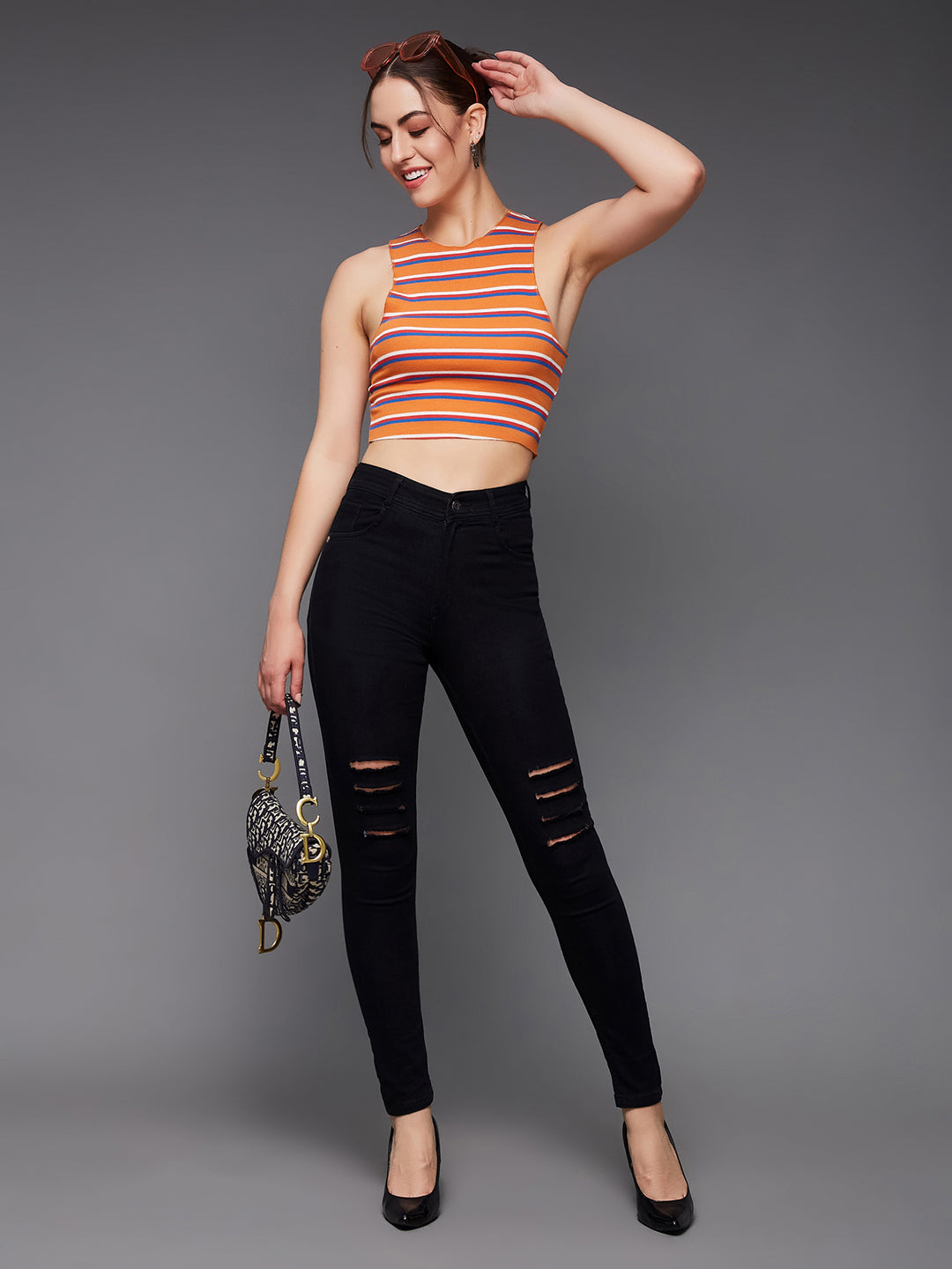 Women's Black Slim Fit High Rise Regular Length Mild Distressed Ripped Denim Stretchable Jeans