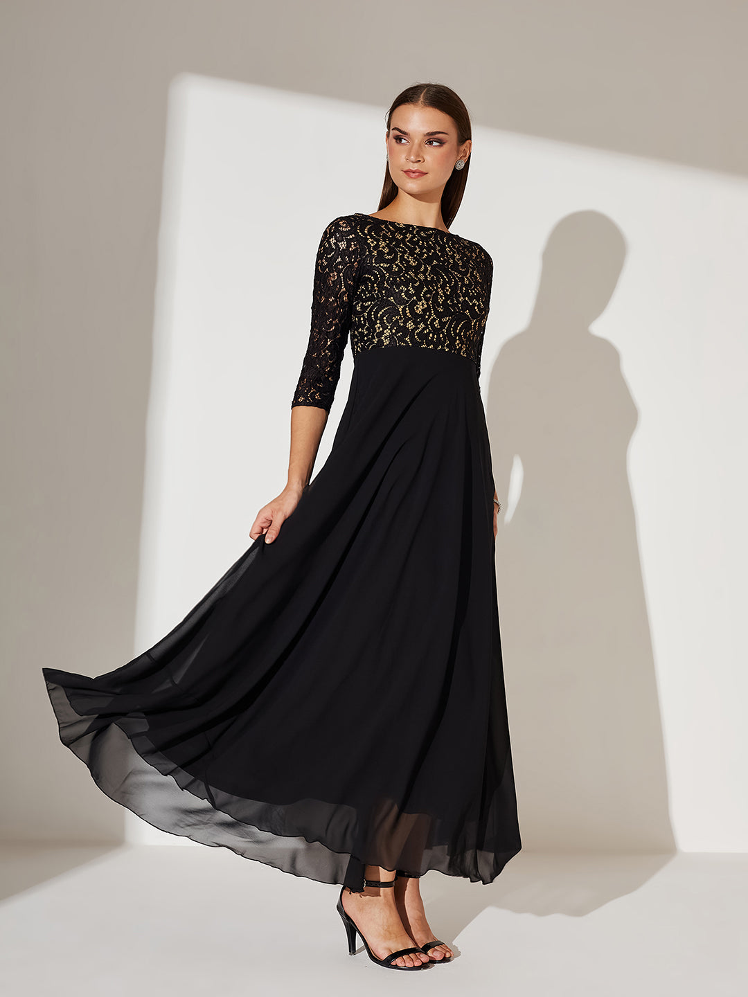 Women's Black Self Design Boat Neck 3/4 Sleeves Side Pocketed Georgette Fit and Flare Maxi Length Dress