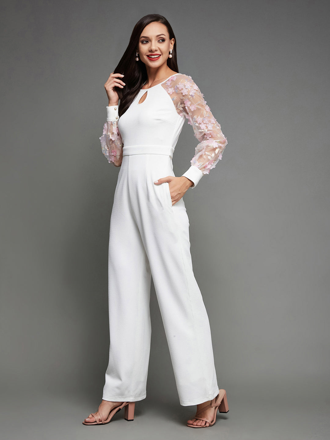 Women's Off White Floral Keyhole Neck Bishop Sleeves Side Pocketed Polyester Back Tie-Up Regular-Length Jumpsuit