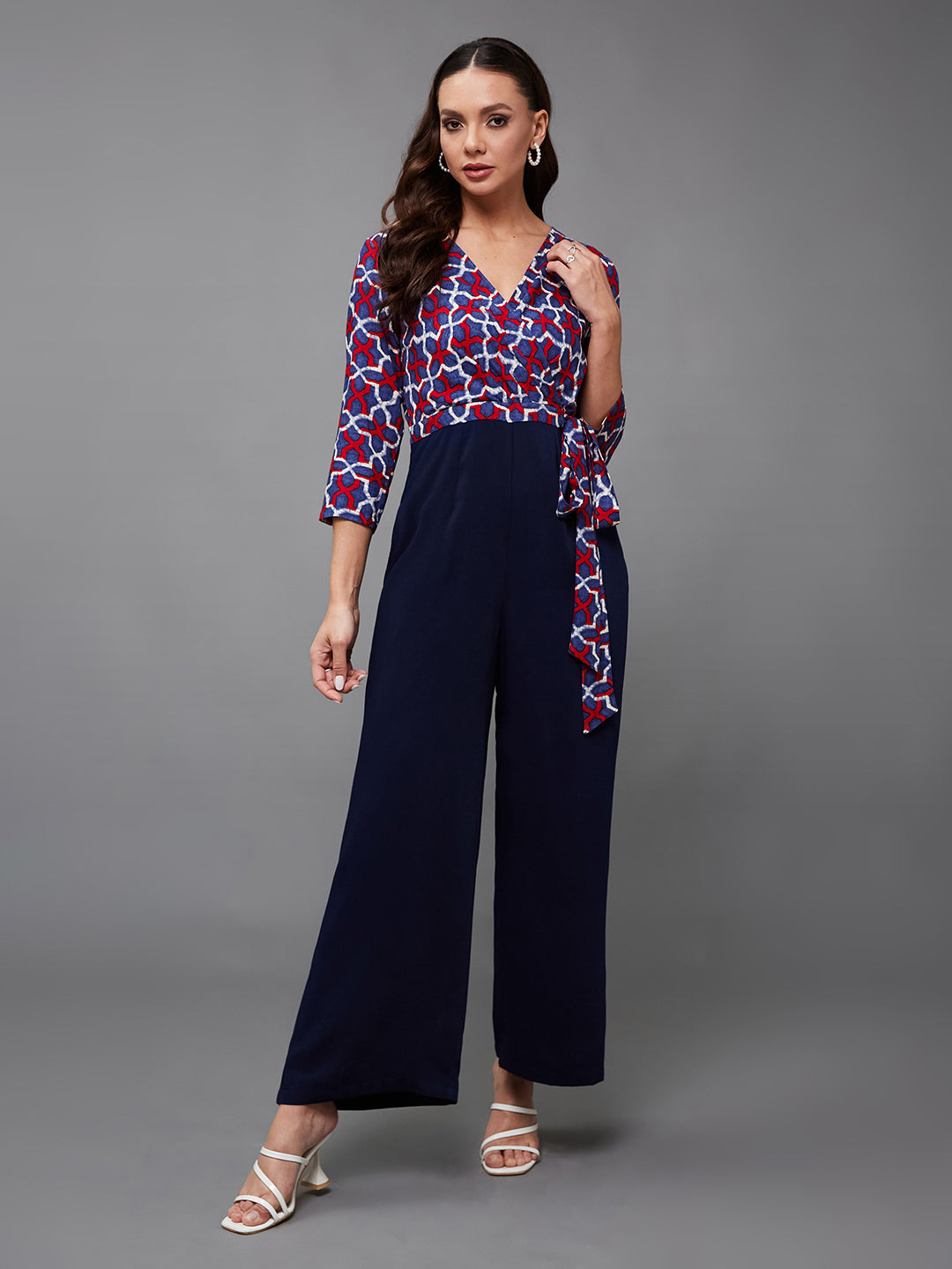Women's Multicolored-Base-Navy Blue V-Neck Three-Quarter Sleeve Geometric Patterned Wrap Regular-Length Polyester Jumpsuit