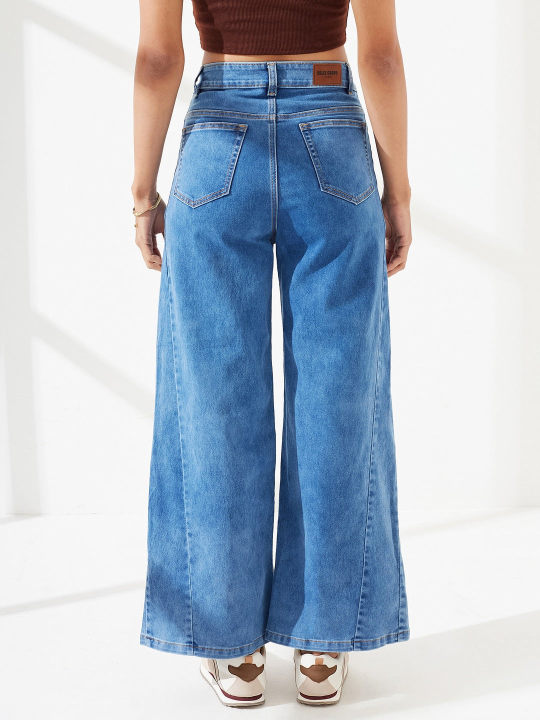 Mid Blue Wide Leg High-Rise Curved Panel Stretchable Denim Jeans For Women