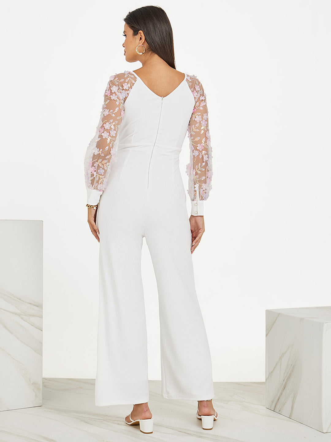 Women's Off White Floral Keyhole Neck Bishop Sleeves Side Pocketed Polyester Back Tie-Up Regular-Length Jumpsuit