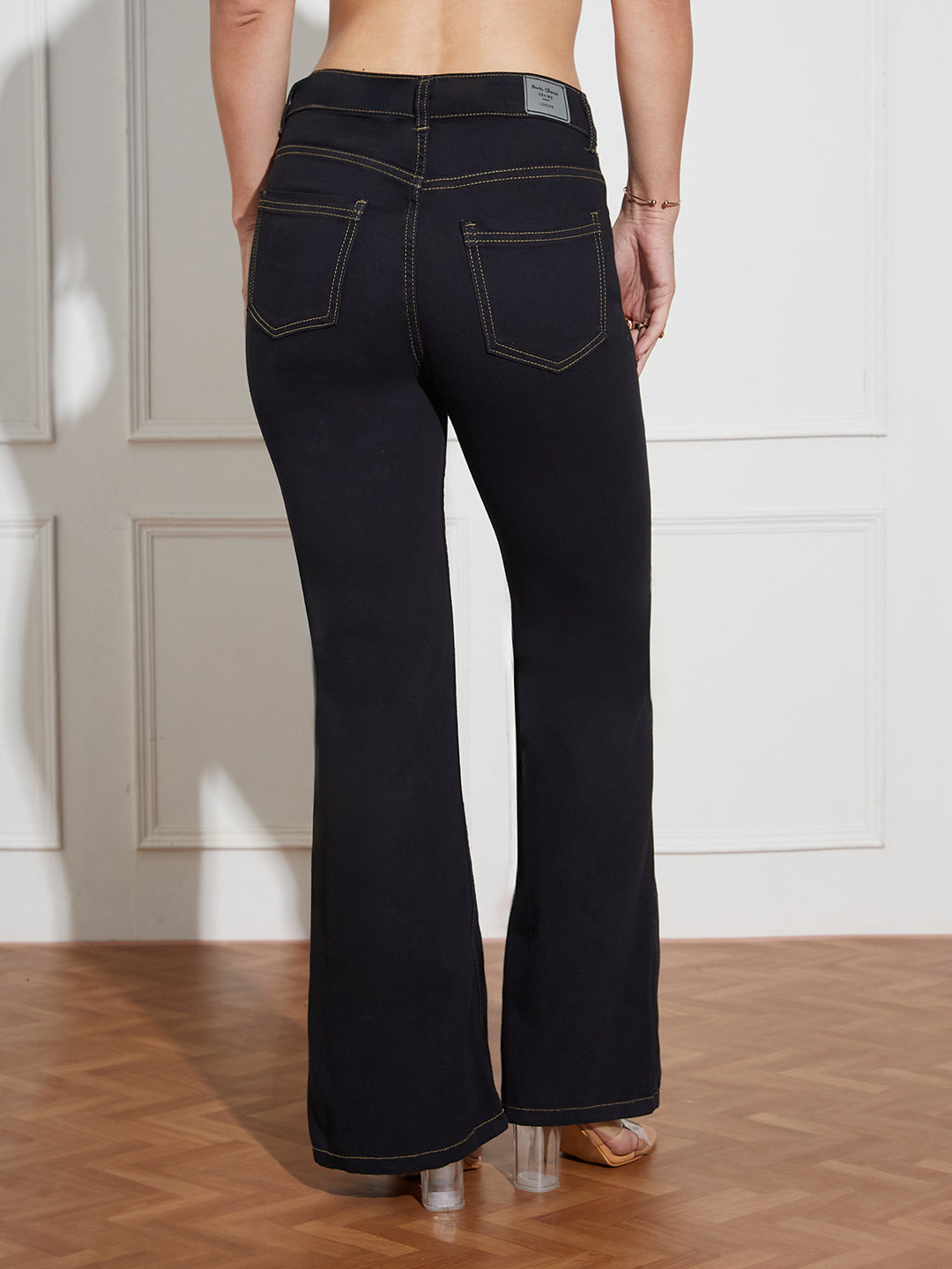 Women's Black Bootcut High-Rise Clean-Look Regular-Length Stretchable Denim Jeans