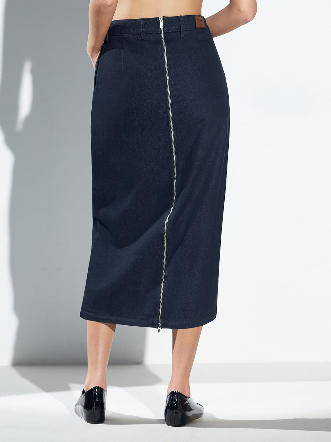 Black High-Rise Straight Fit Denim Midi Skirt with Zip Closure & Back Slit For Women