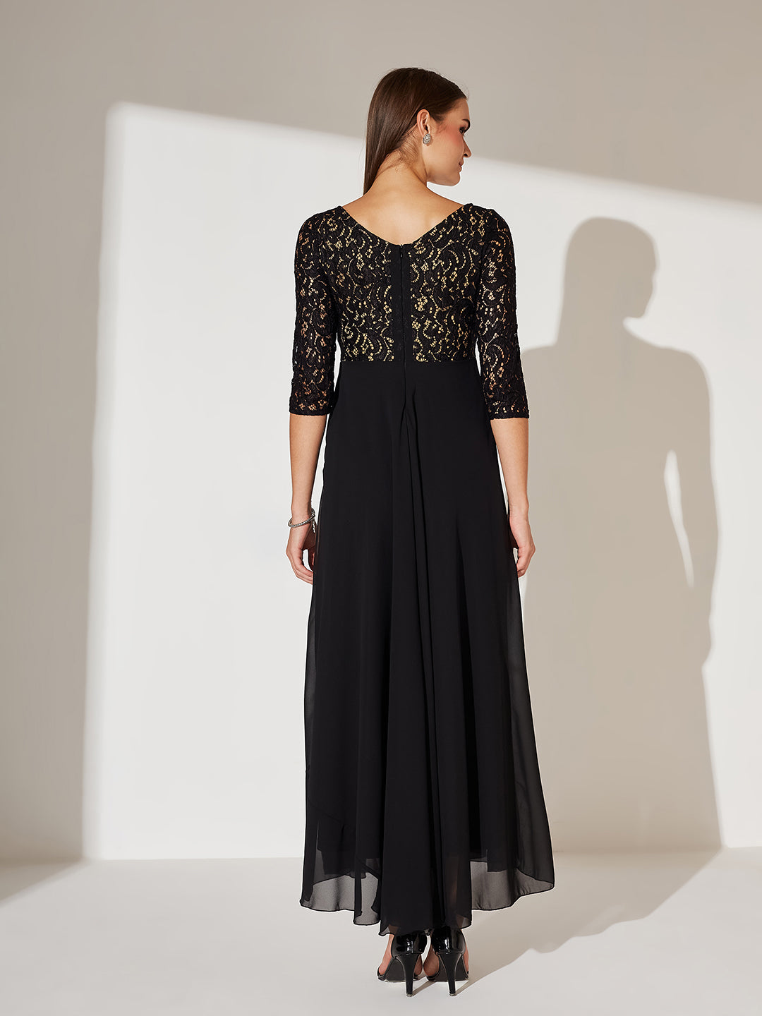 Women's Black Self Design Boat Neck 3/4 Sleeves Side Pocketed Georgette Fit and Flare Maxi Length Dress