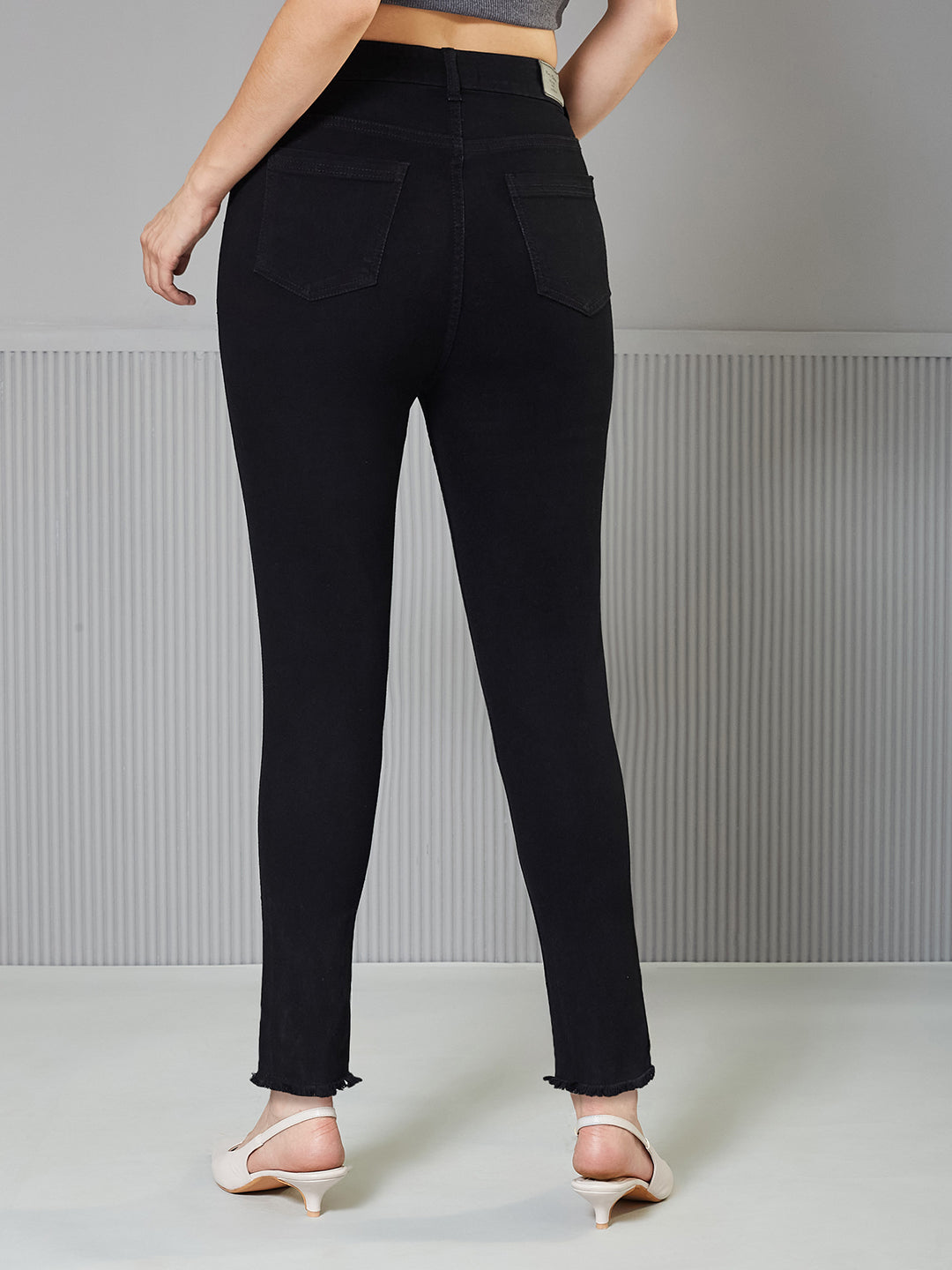 Black Skinny-Fit High-Rise Cropped Fringed Hemline Solid Stretchable Denim Jeans for Women — Miss Chase