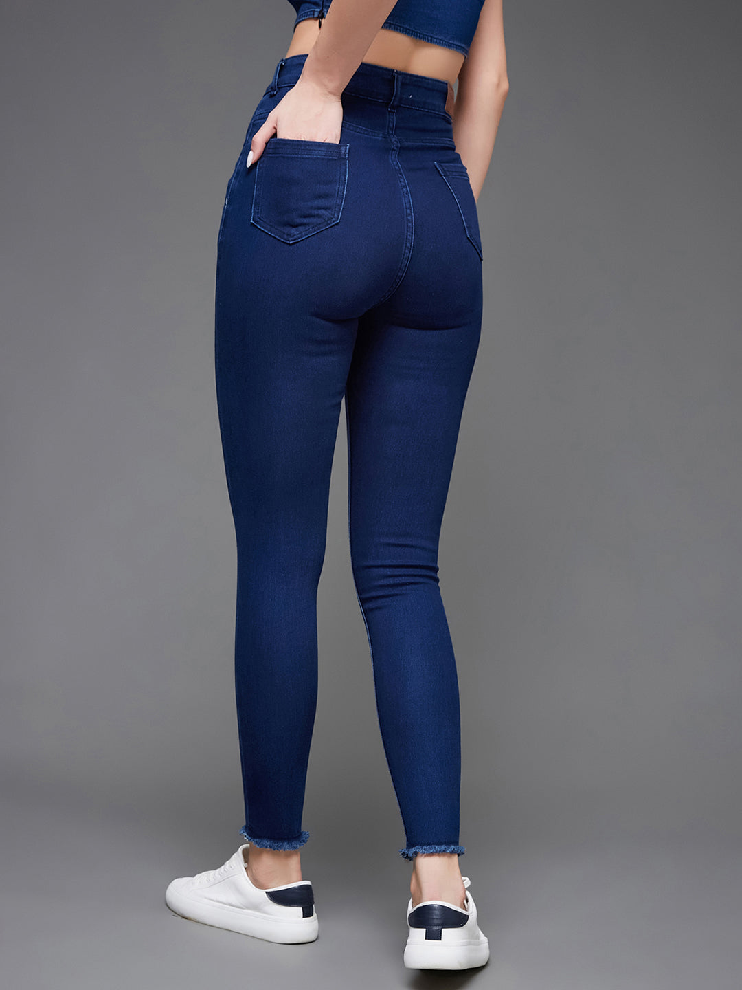 Women's Navy Blue Skinny High-Rise Solid Cropped Fringed Hemline Stretchable Denim Jeans