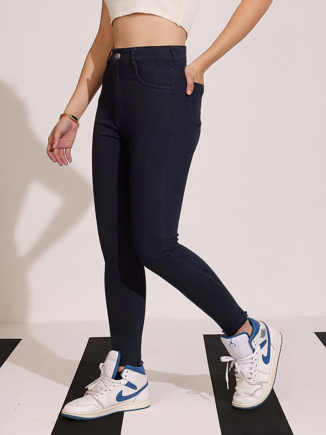 Women's Black Skinny Fringed Detailing High Rise Clean Look Solid Cropped Stretchable Denim Jeans