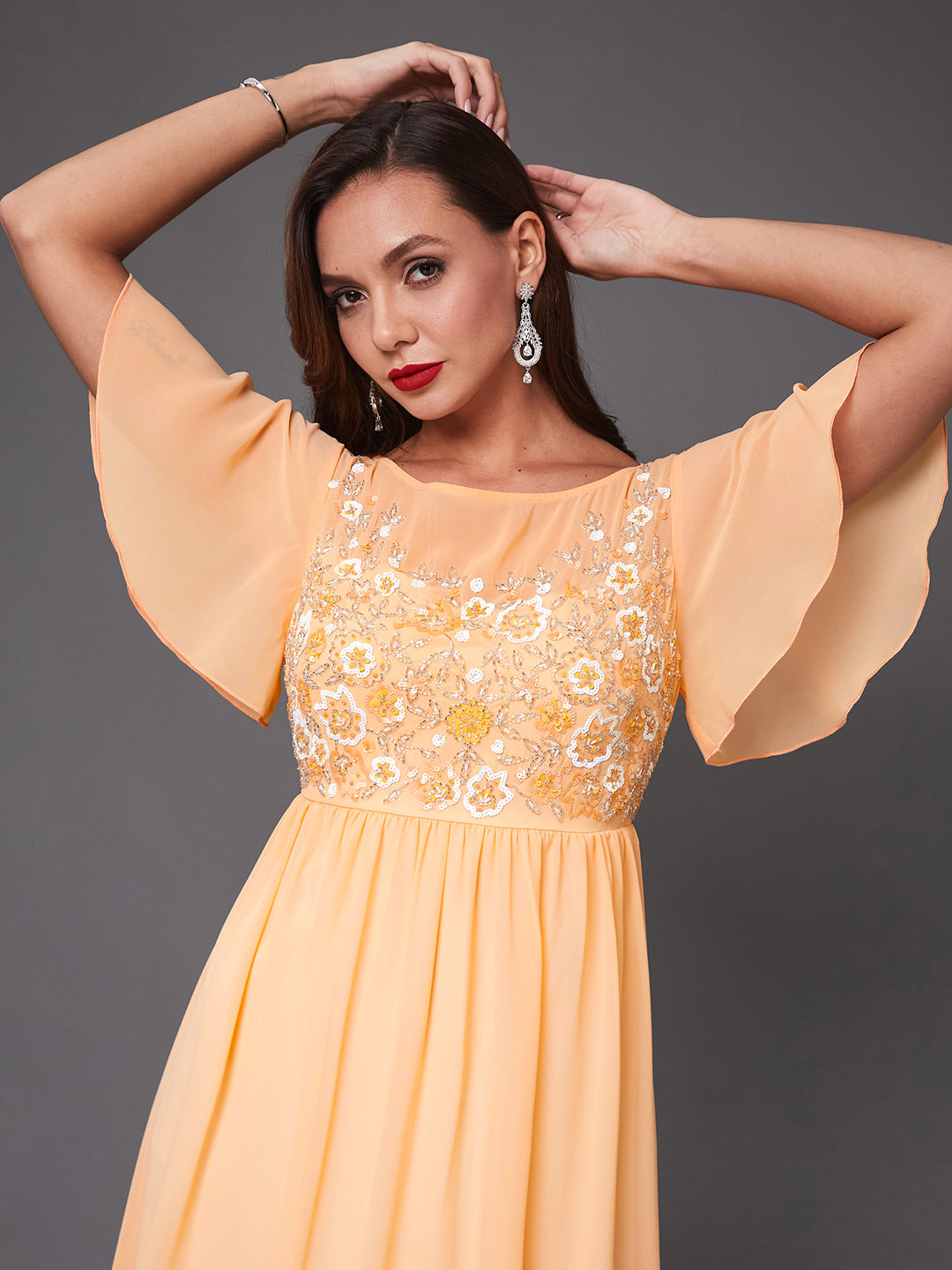 Women's Peach Boat Neck Half Sleeve Solid Embellished Georgette Maxi Dress