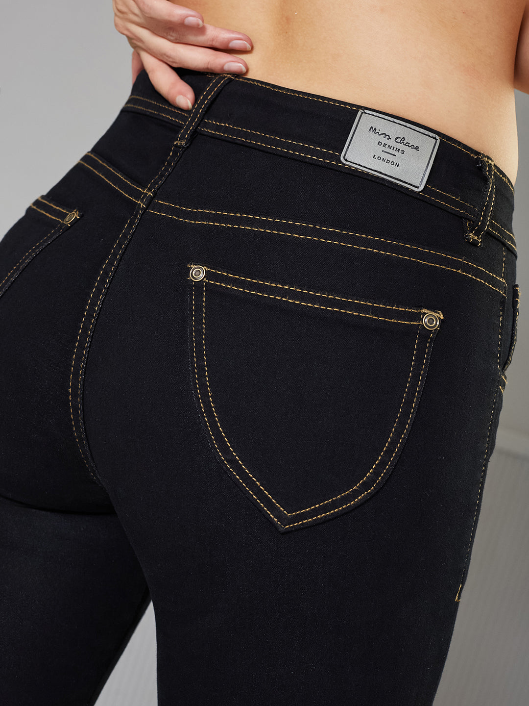 Women's Black Skinny High-Rise Side Slit Solid Ankle Length Stretchable Denim Jeans