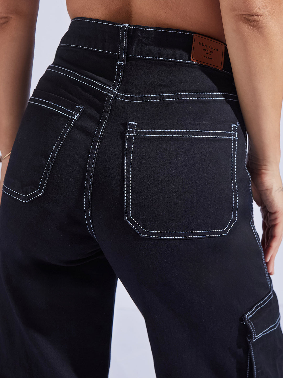Women's Black Wide-Leg High-Rise Clean-Look Regular-Length Stretchable Patch-Pocketed Denim Jeans