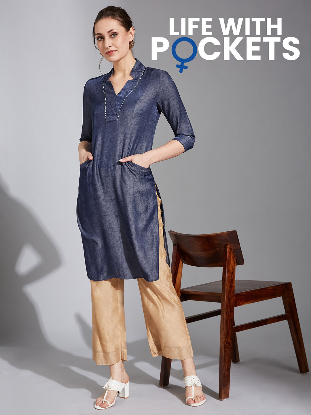 Women's Blue Stand Collar Three-Quarter Sleeve Solid Back Pleated Knee-Long Polyester Kurta