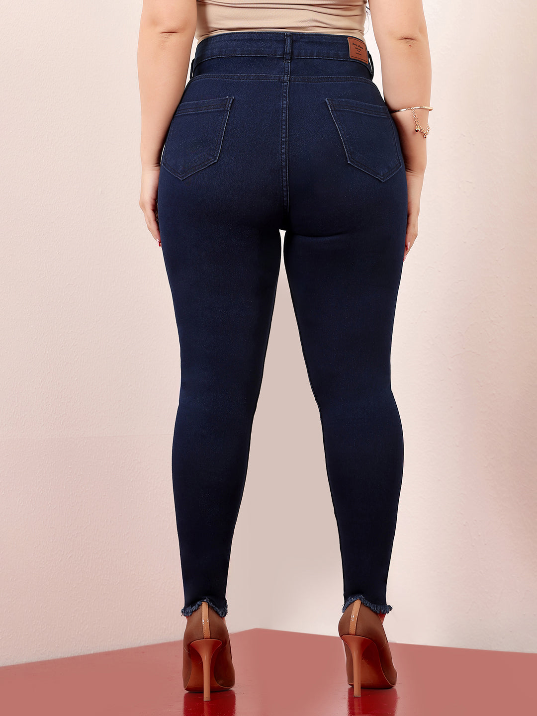 Women's Navy Blue Skinny High-Rise Solid Clean-Look Cropped Fringed-Hemline Stretchable Denim Jeans