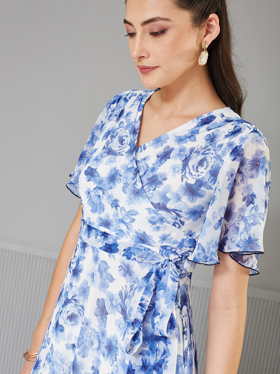 Women's Multicolored Floral Wrap Chiffon Maxi Dress with White Base & Flutter Sleeves