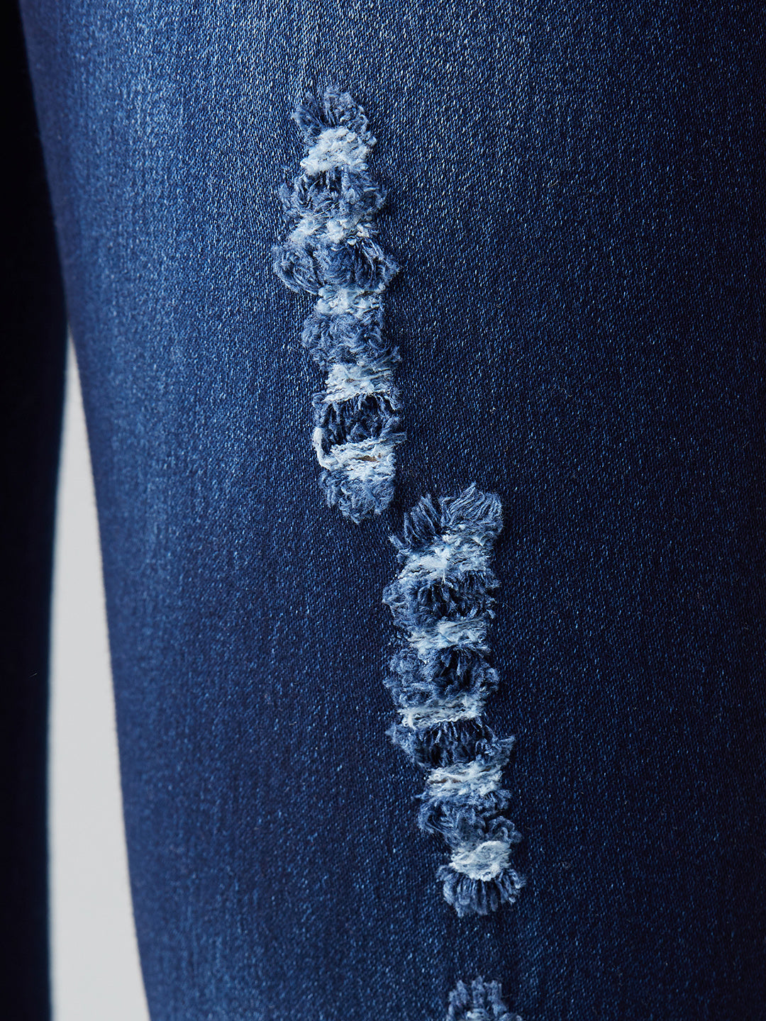 Women's Blue Skinny-Fit Mid-Rise Midly-Distressed Ripped Denim Jeans