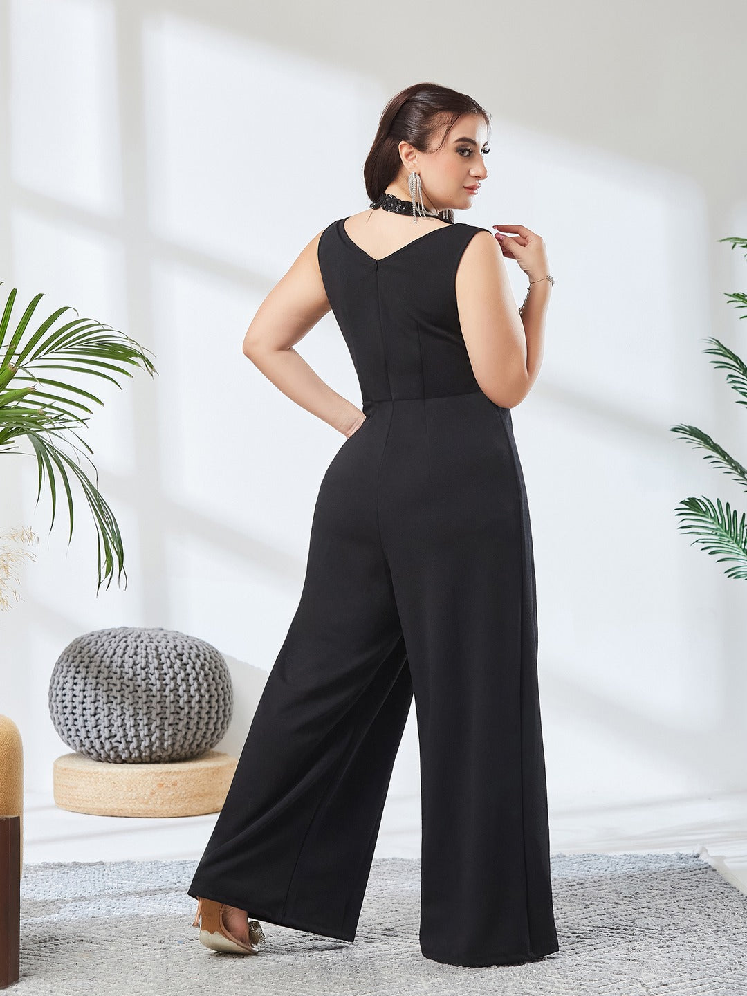Black Halter Neck Sleeveless Solid Pleated/Wide Leg Sequin Paneled Regular Length Jumpsuit for Women