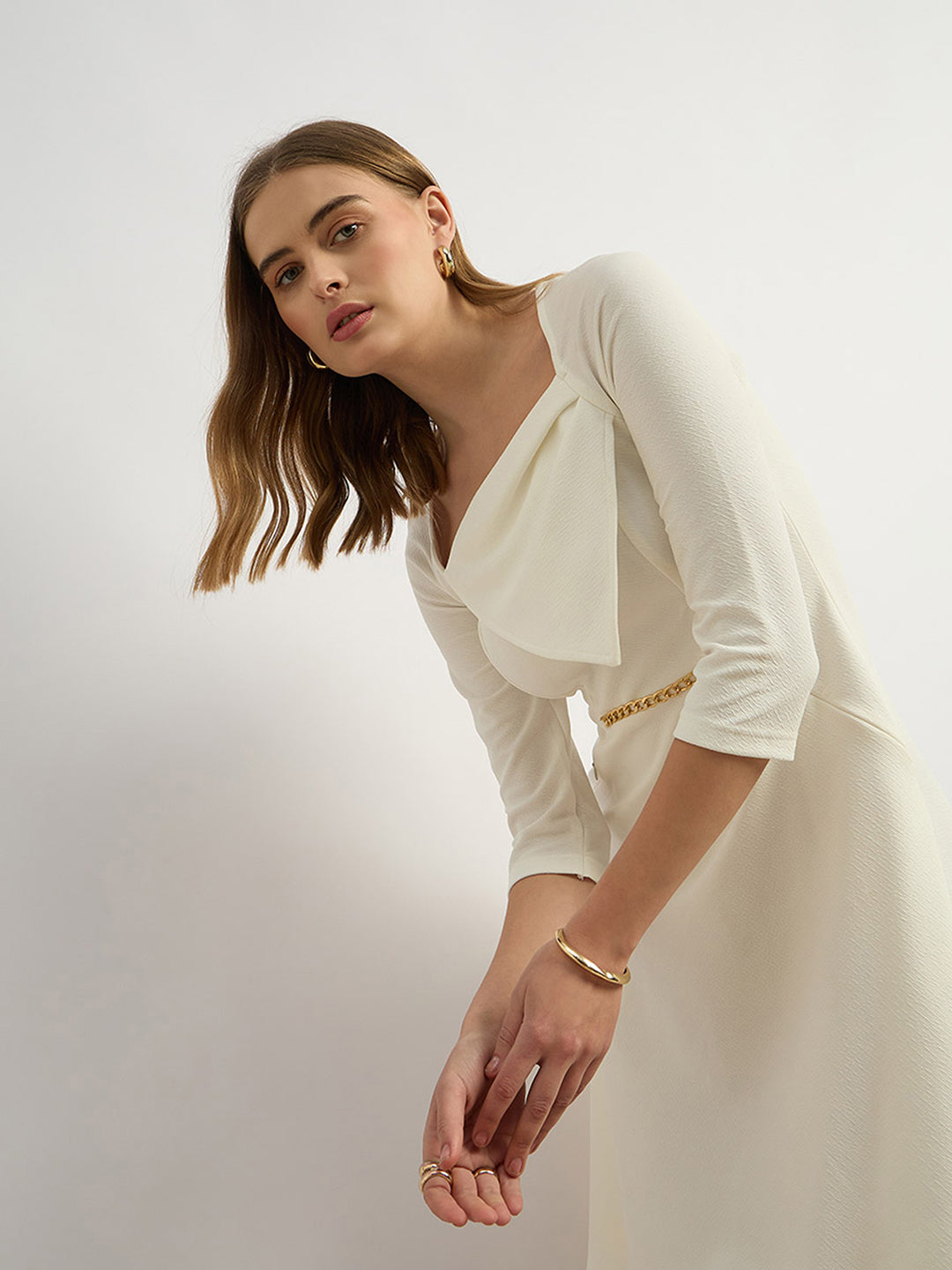 Women's Off White Solid Square Neck Raglan Sleeves Side Pocketed Polyester Fit and Flare Knee-Length Dress