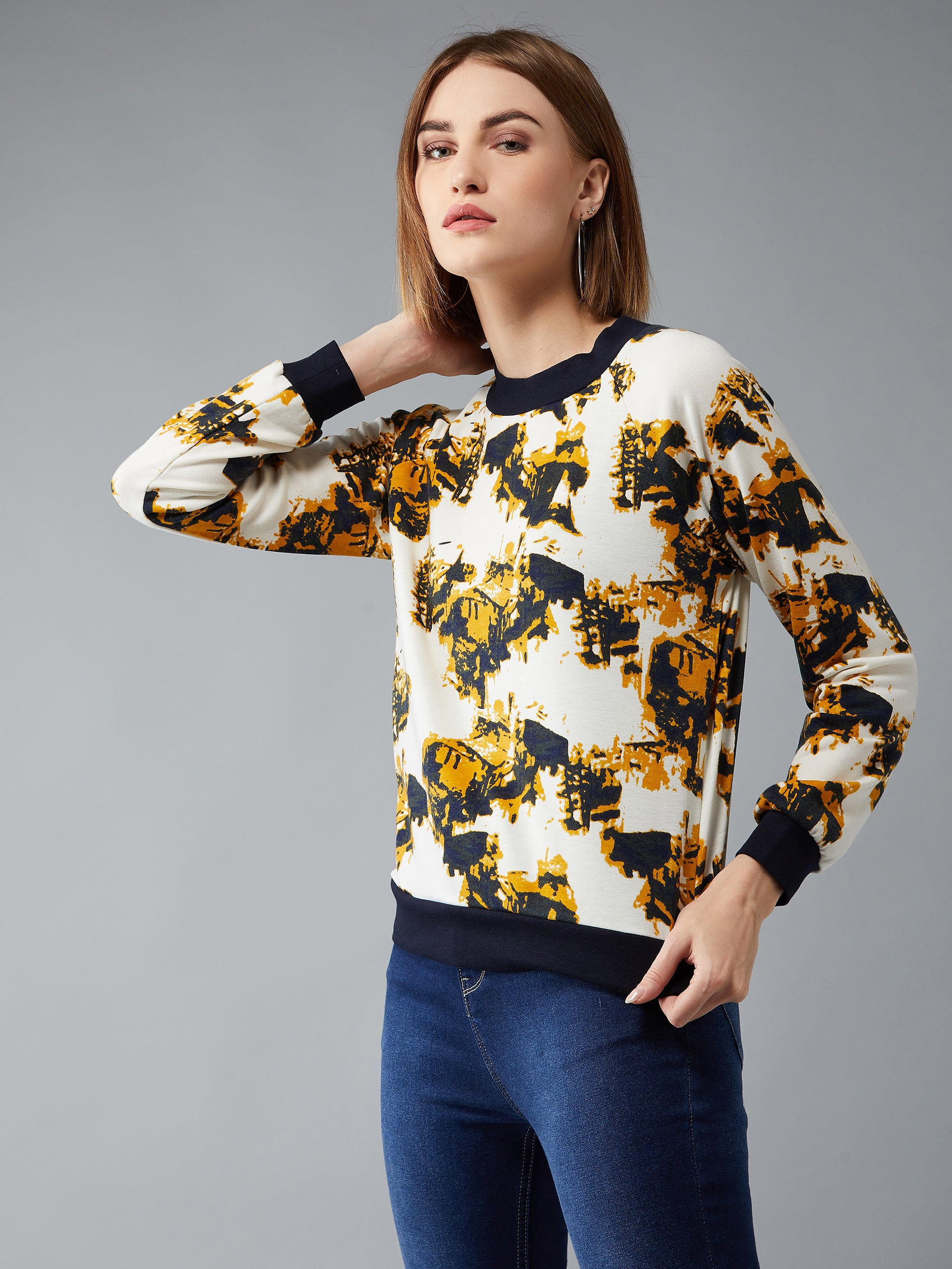 Women's Multicolored-Base-White Round Neck Full Sleeves Abstract Raglan Regular Length Sweatshirt