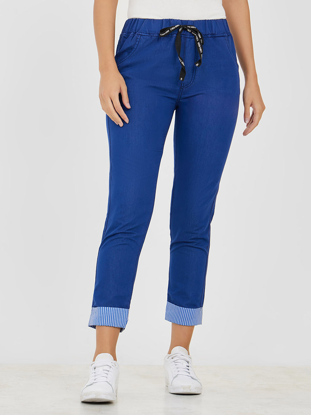 Women's Blue High Rise Clean Look Solid Cropped Striped Detailing Denim Joggers