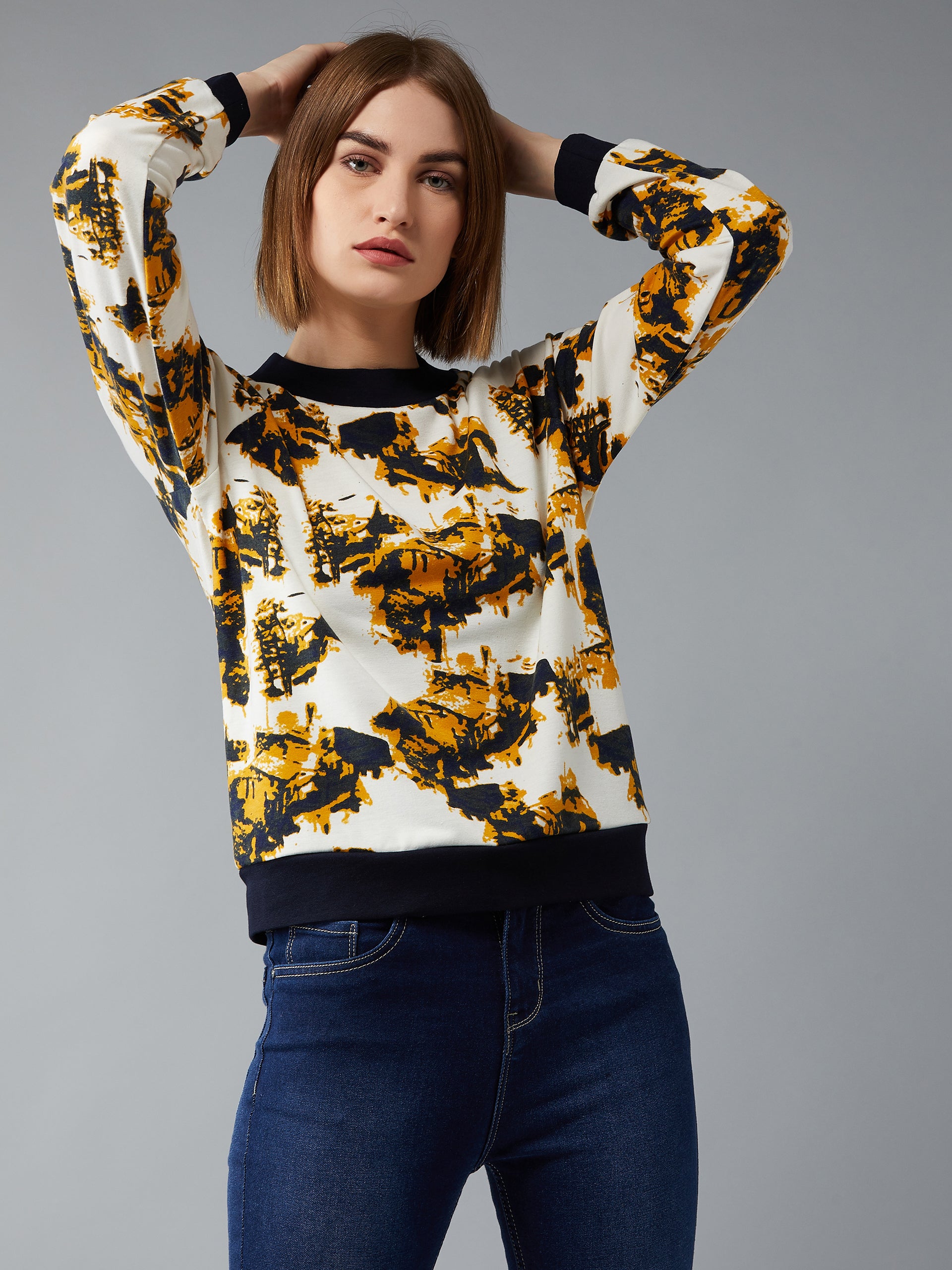 Women's Multicolored-Base-White Round Neck Full Sleeves Abstract Raglan Regular Length Sweatshirt