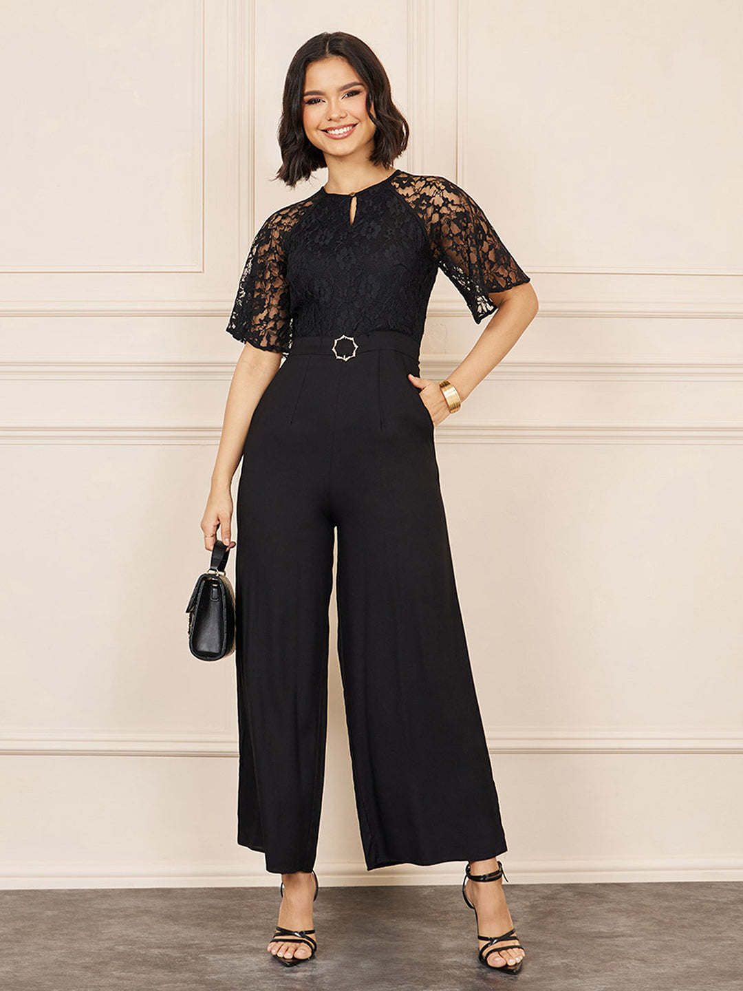 Women's Black Round-Neck Flared Sleeve Floral Raglan Regular Jumpsuit