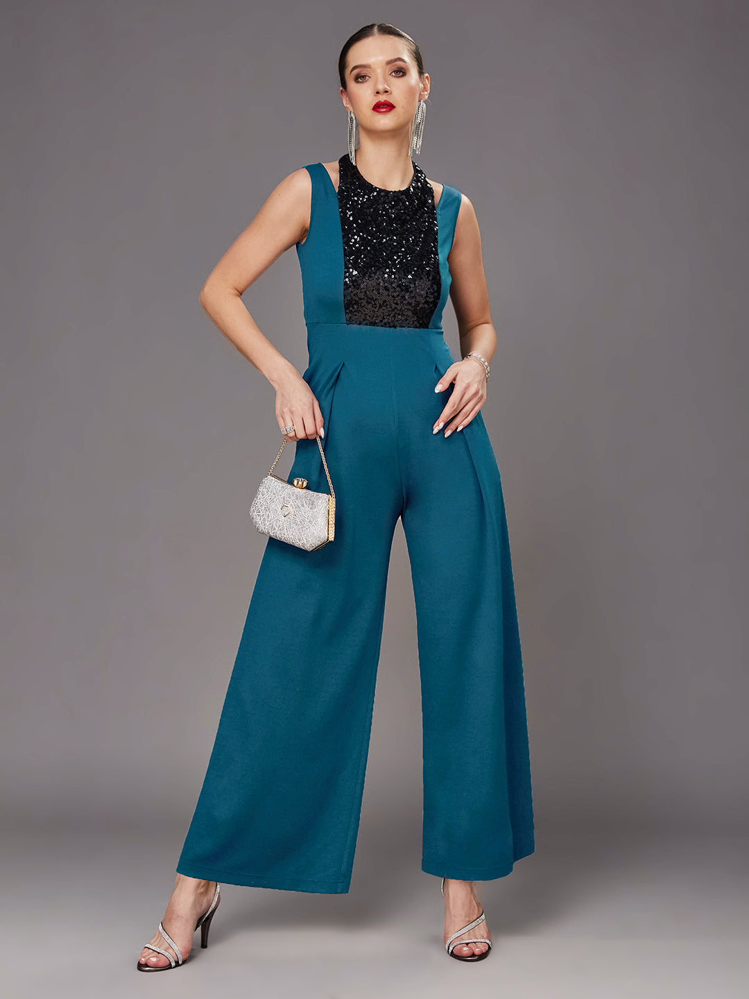 Teal Color Halter Neck Sleeveless Solid Pleated/Wide Leg Sequin Paneled Regular Length Jumpsuit for Women