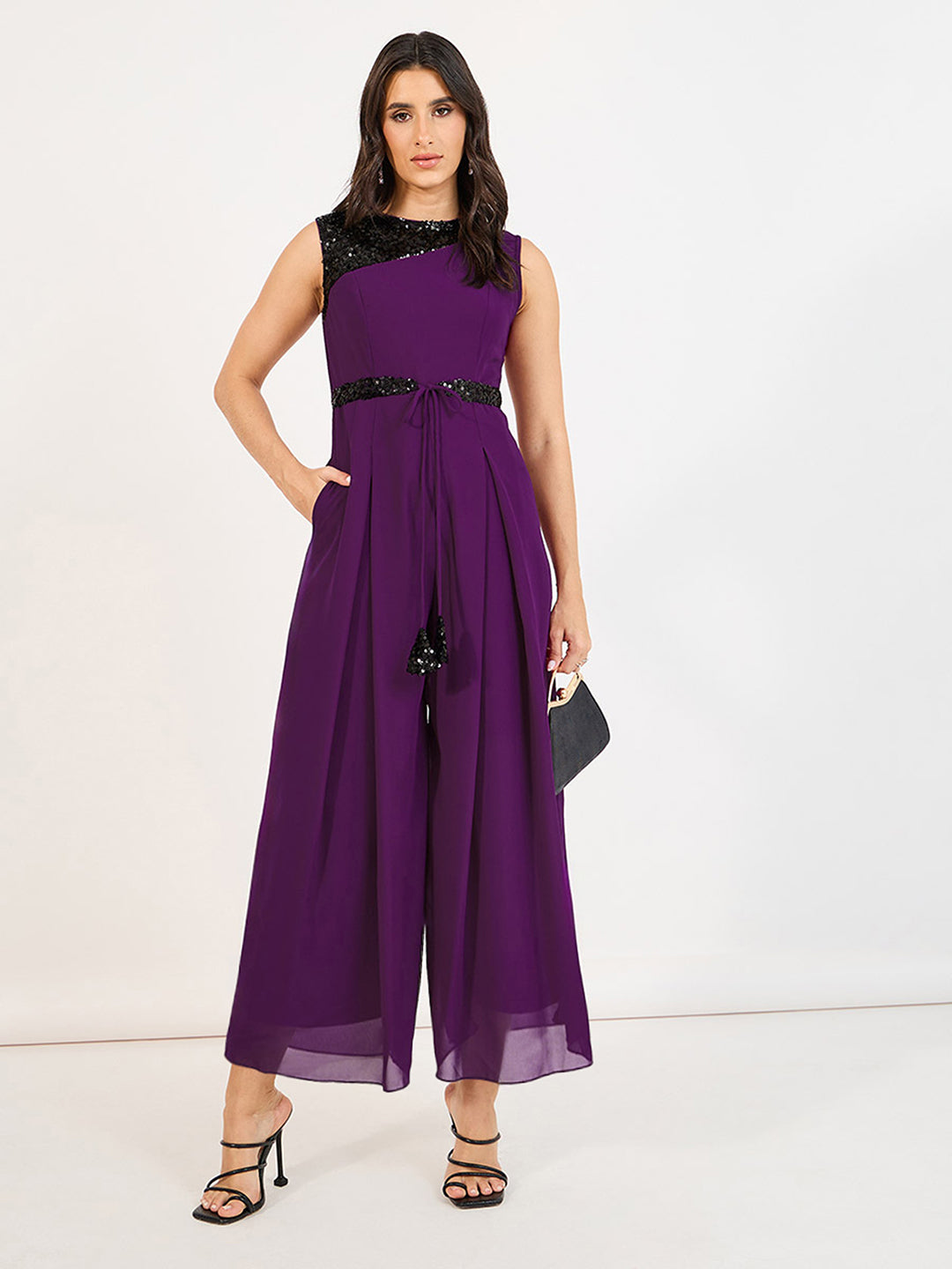 Women's Dark Purple Solid Relaxed Fit Sleeveless Round-Neck Ankle-Length Straight Jumpsuit