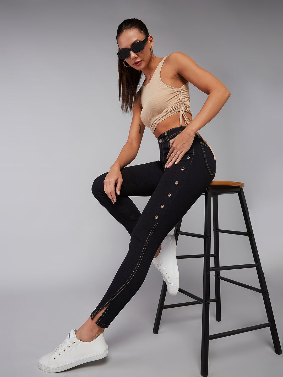 Women's Black Skinny High Rise Side Slit Solid Eyelet Embellished Cropped Length Stretchable Denim Jeans