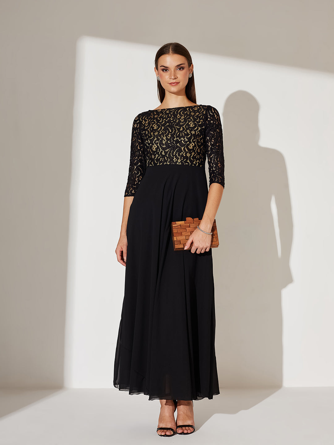 Women's Black Self Design Boat Neck 3/4 Sleeves Side Pocketed Georgette Fit and Flare Maxi Length Dress