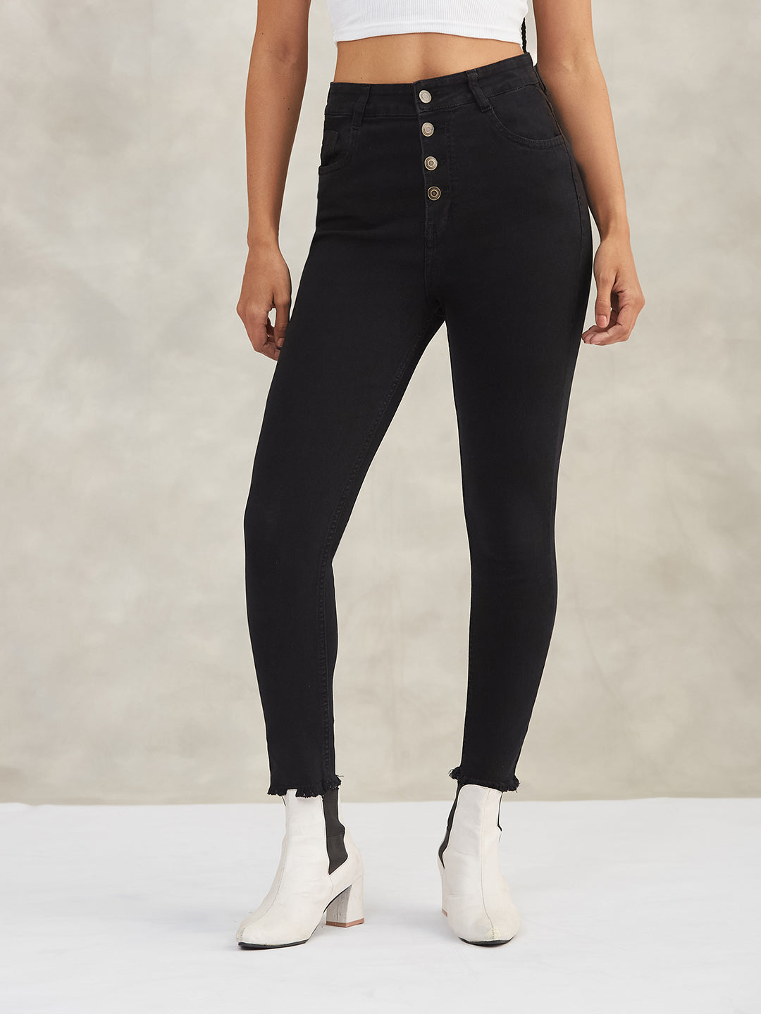 Black Skinny-Fit High-Rise Cropped Fringed Hemline Solid Stretchable Denim Jeans for Women