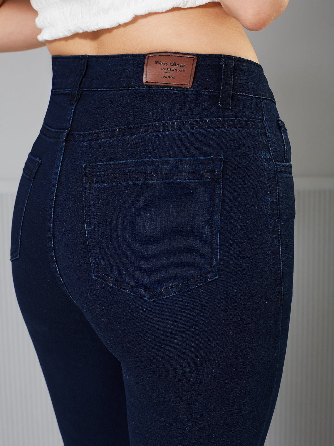 Women's Navy Blue Bootcut High-Rise clean-look Regular Stretchable Denim Jeans