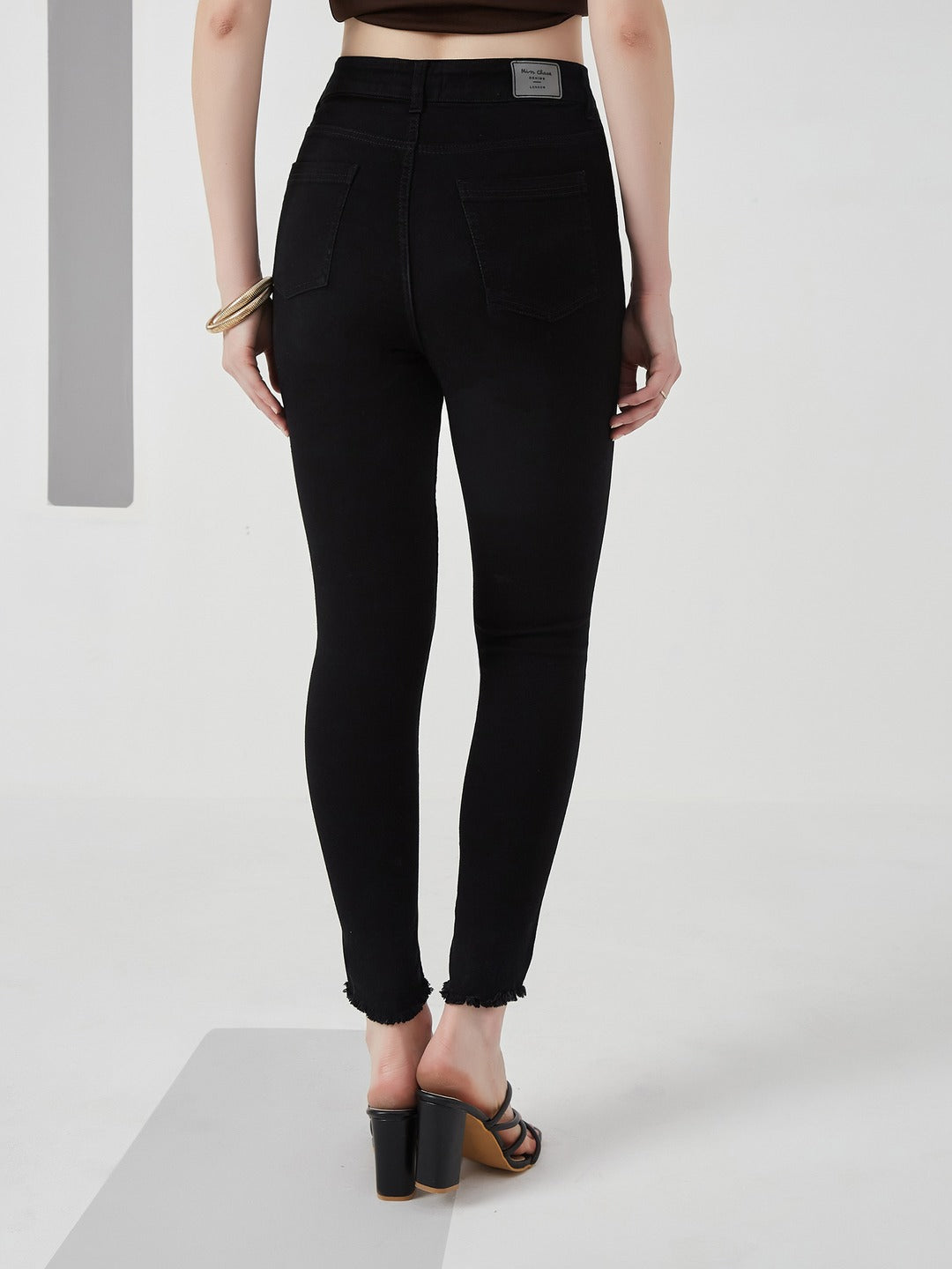 Black Skinny high-rise Cropped Fringed Hemline Solid Stretchable Denim Jeans for Women