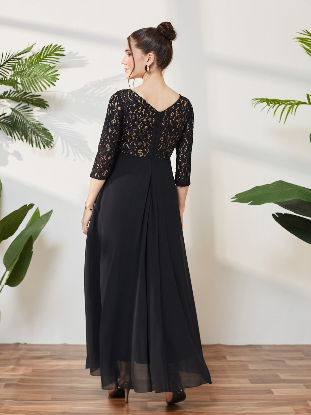 Black Self Design Boat Neck 3/4 Sleeves Side Pocketed Georgette Fit and Flare Maxi Length Dress for Women