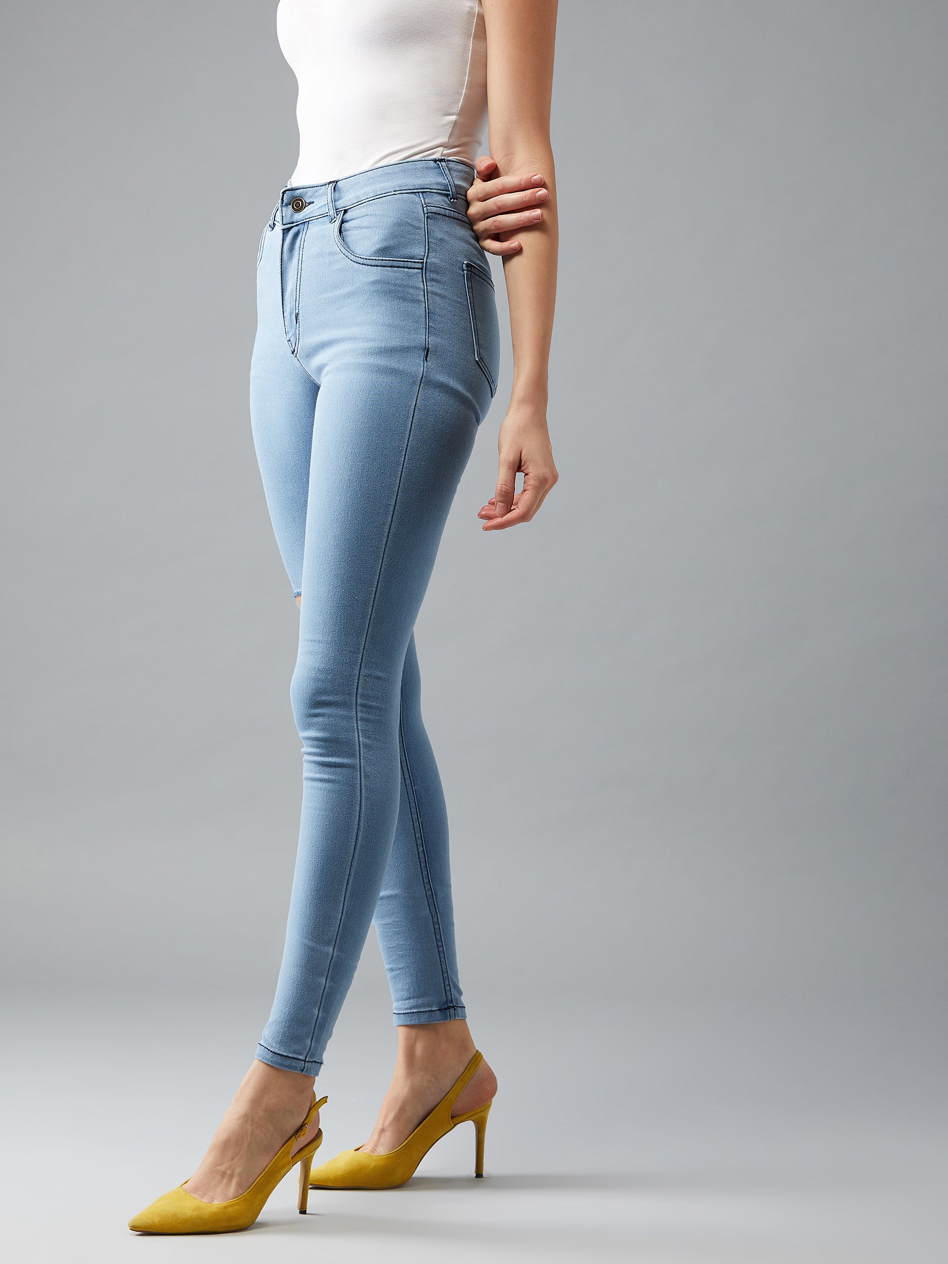 Women's Light Blue Skinny Mid Rise Clean Look knee Cut-out detailing Regular length Stretchable Denim Jeans