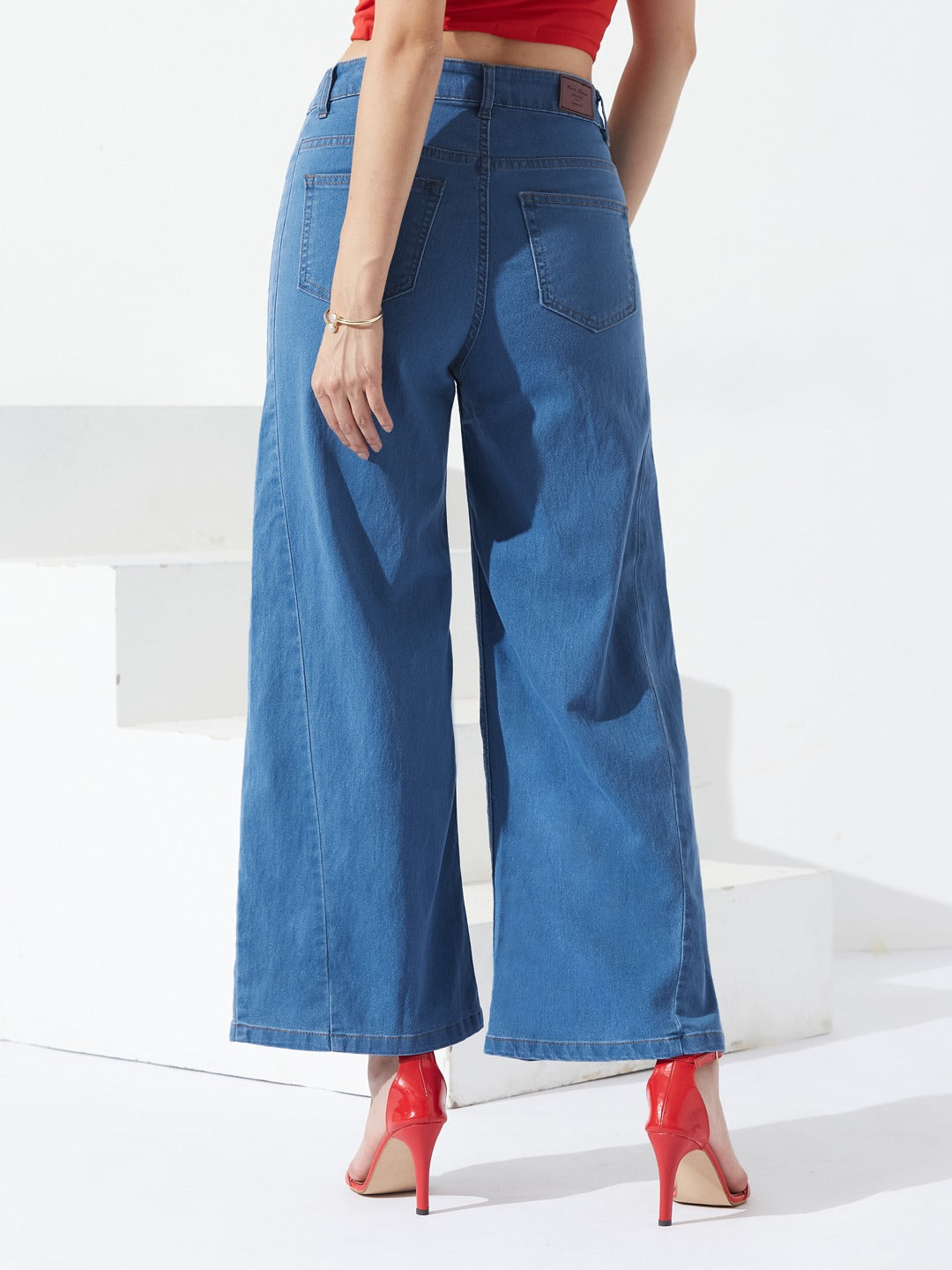 Mid Blue Wide Leg high-rise Curved Panel Stretchable Denim Jeans for Women