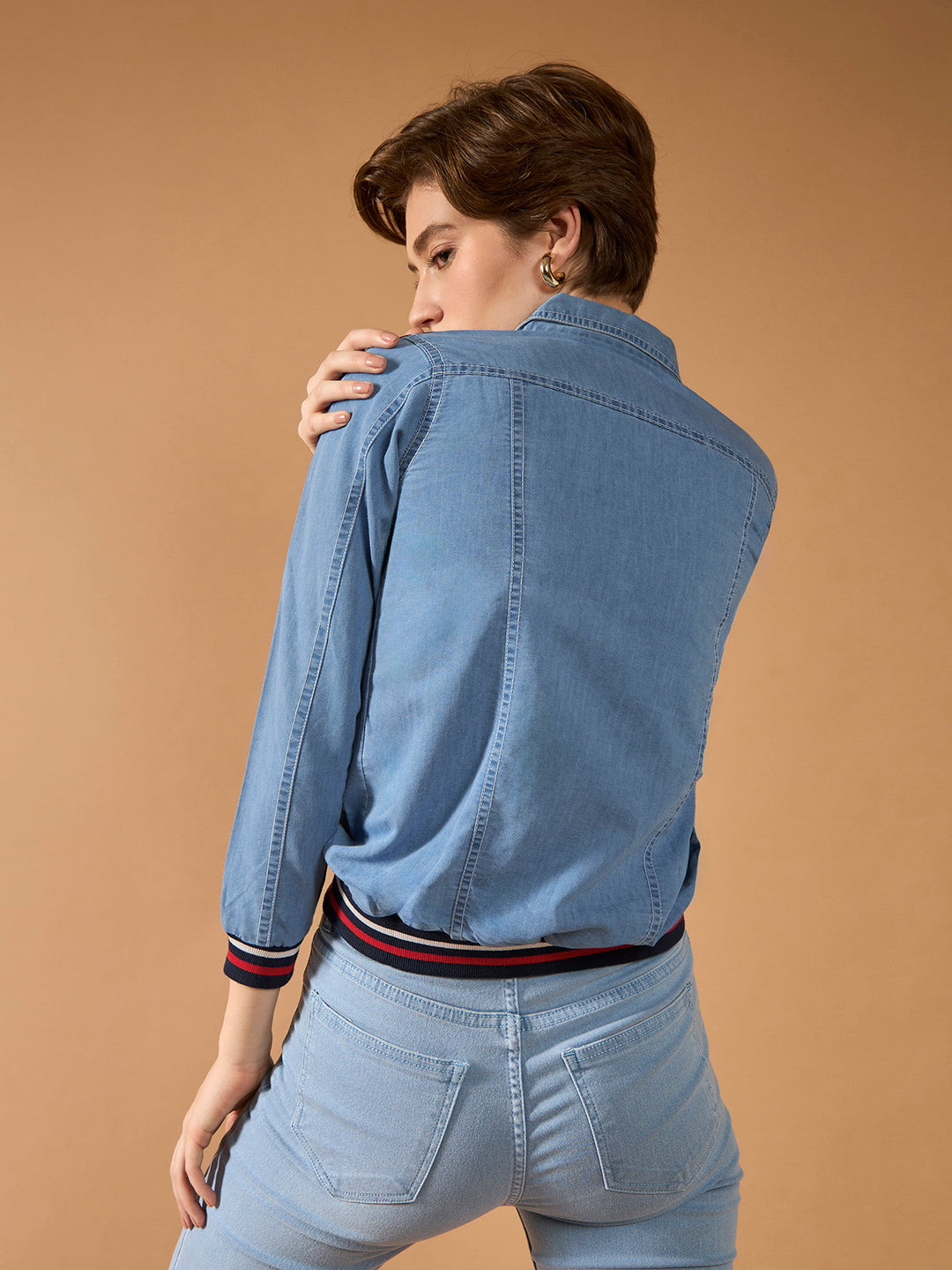 Women's Light Blue Polo Neck Full Sleeve Solid Buttoned Rib And Twill Tape Detailing Bomber Denim Jacket