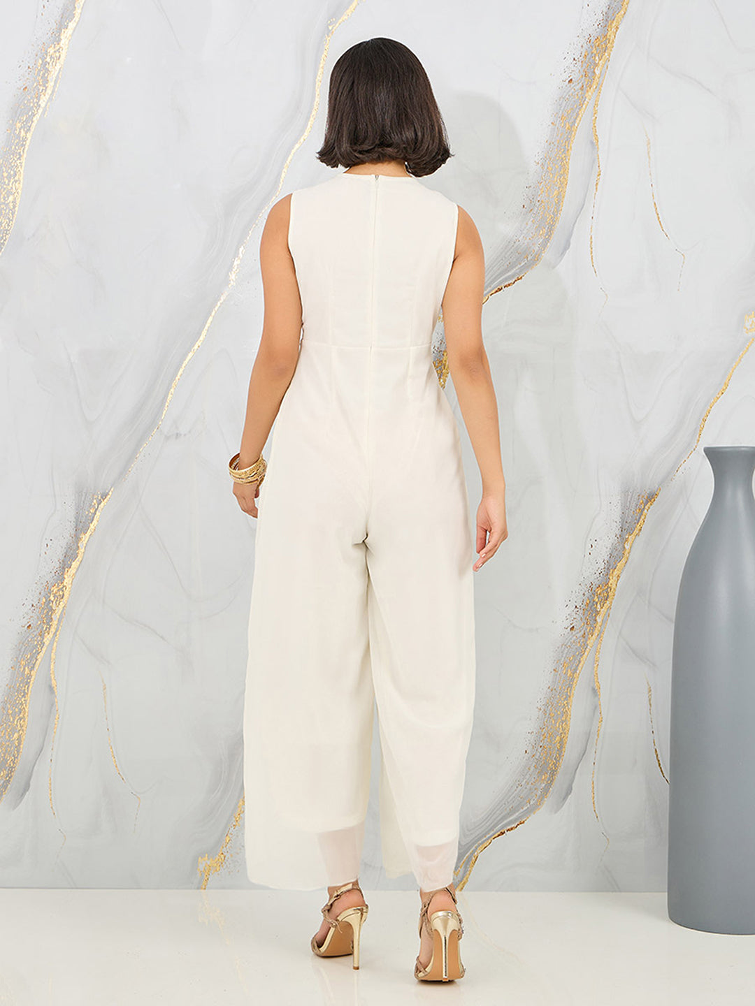 Women's Off-White Solid Relaxed Fit Sleeveless Round-Neck Ankle-Length Straight Jumpsuit