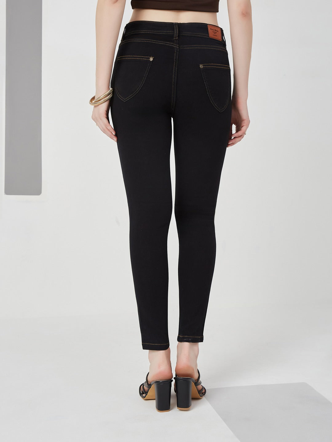 Black Skinny high-rise Side Slit Solid Ankle Length Stretchable Denim Jeans for Women