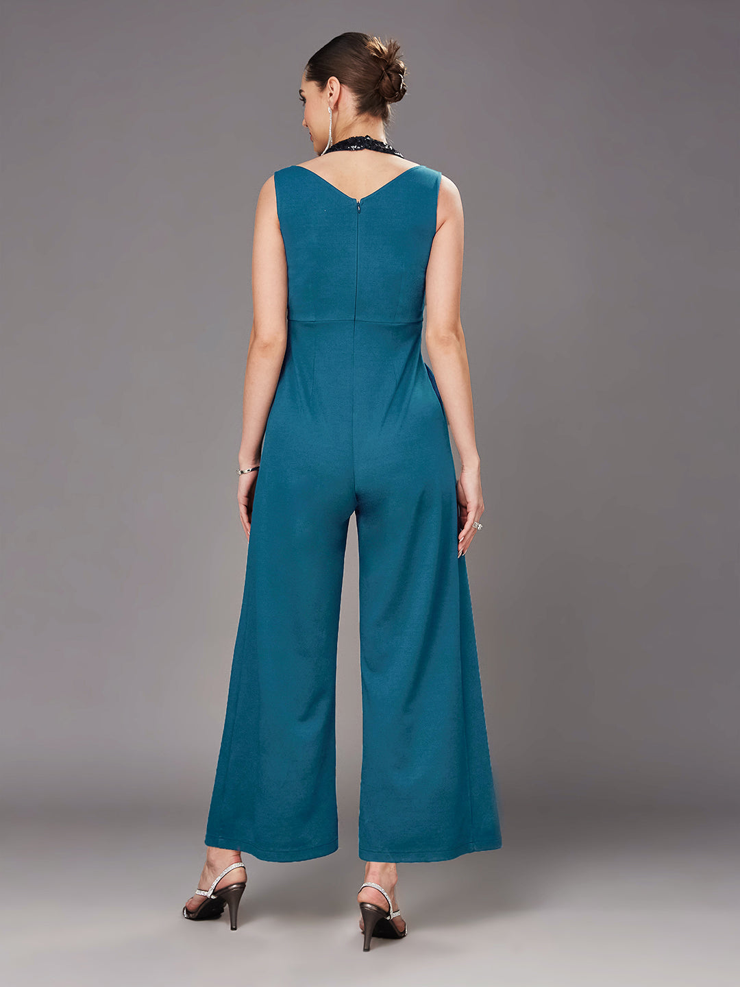 Teal Color Halter Neck Sleeveless Solid Pleated/Wide Leg Sequin Paneled Regular Length Jumpsuit for Women