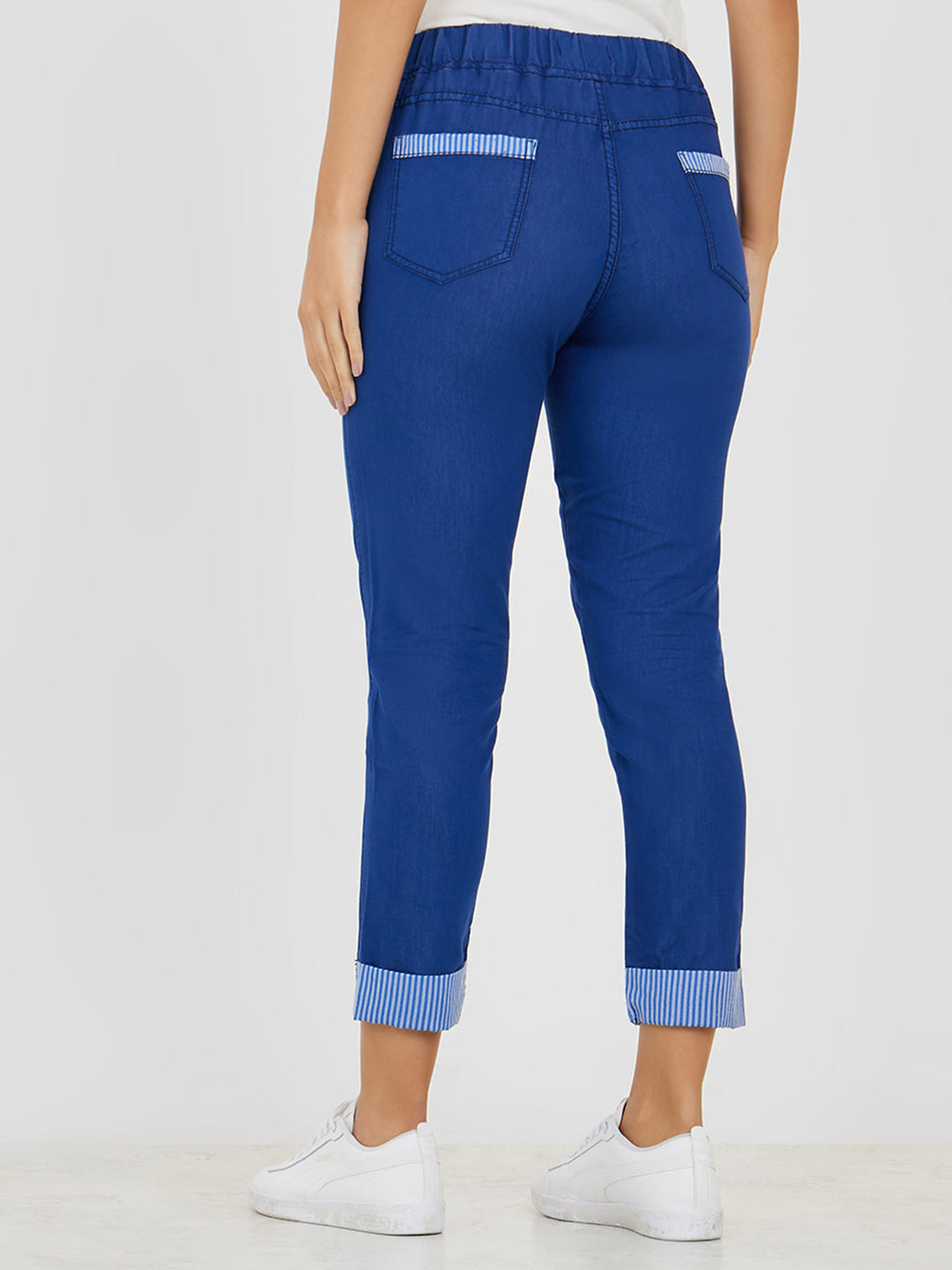 Women's Blue High Rise Clean Look Solid Cropped Striped Detailing Denim Joggers