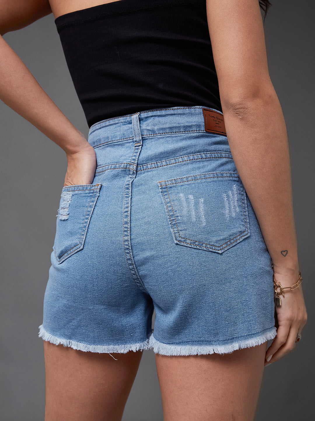 Women's Blue Relaxed Fit Highly Distressed Mid Rise Ripped Denim Shorts