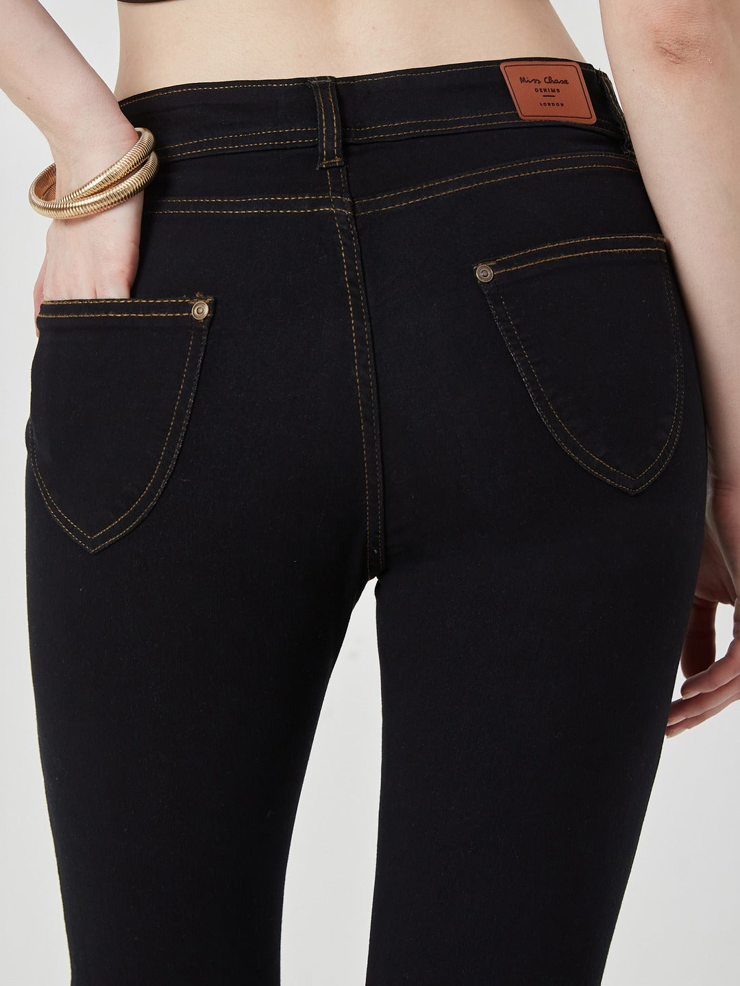 Black Skinny high-rise Side Slit Solid Ankle Length Stretchable Denim Jeans for Women