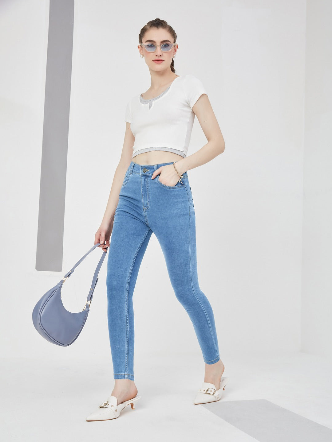 Blue Solid Skinny high-rise Cropped Fringe Detailing Solid Stretchable Denim Jeans for Women