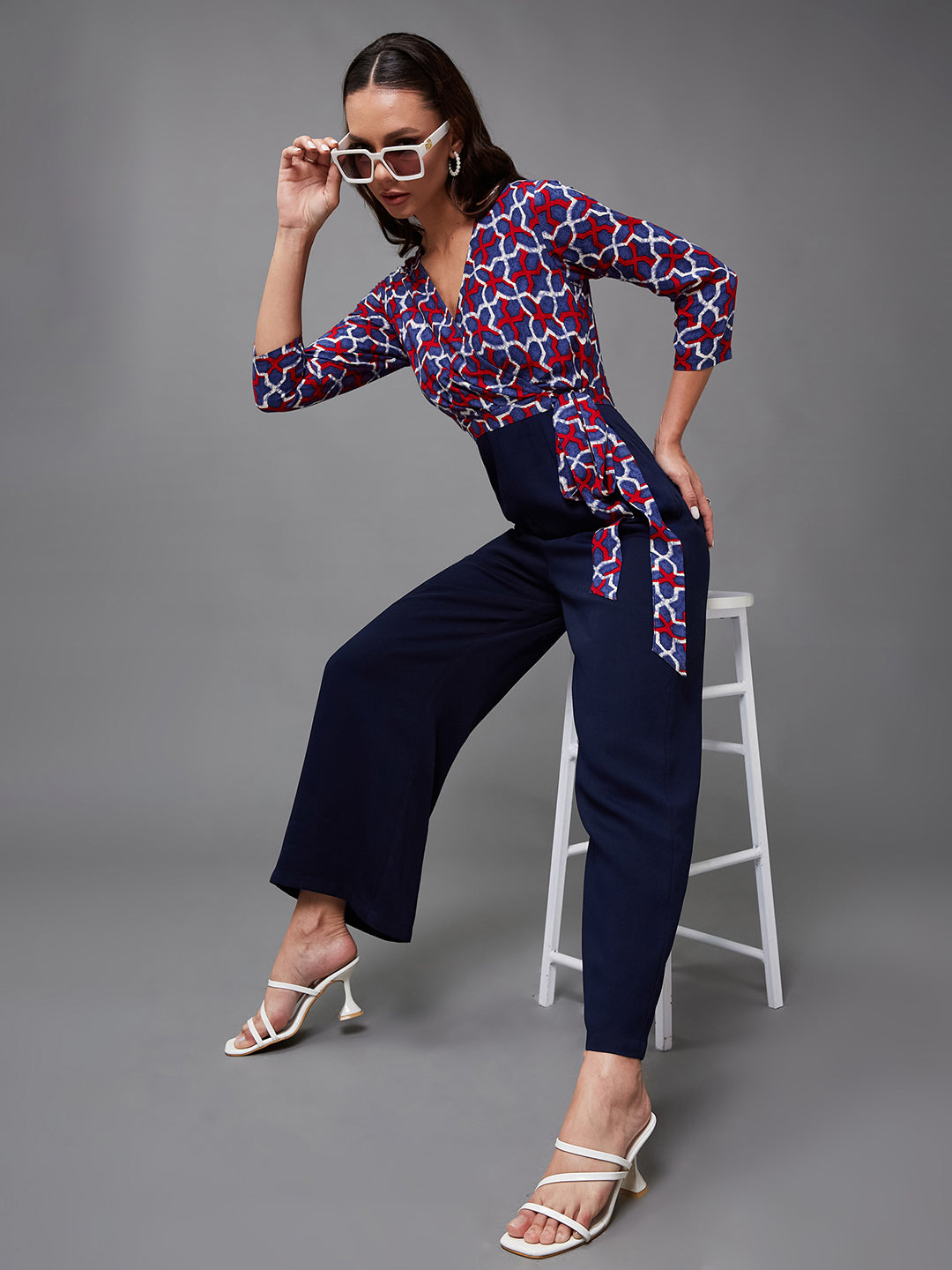 Women's Multicolored-Base-Navy Blue V-Neck Three-Quarter Sleeve Geometric Patterned Wrap Regular-Length Polyester Jumpsuit