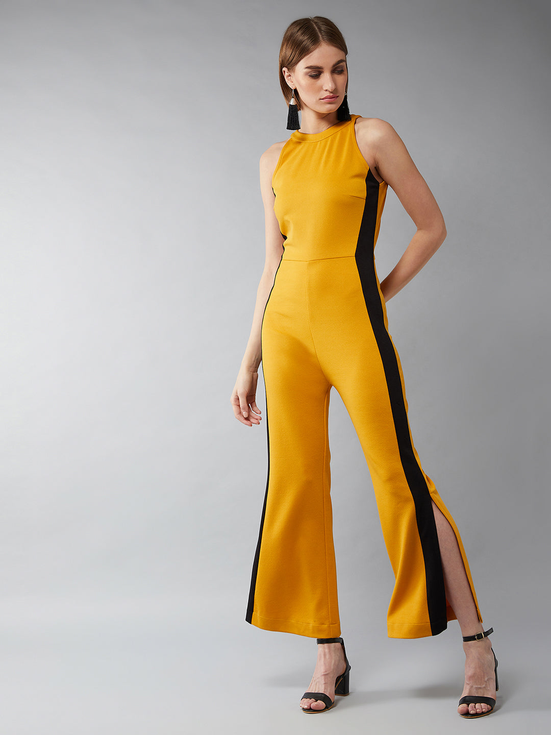 Women's Mustard Yellow & Black Halter Neck Sleeveless Solid Flared Jumpsuit