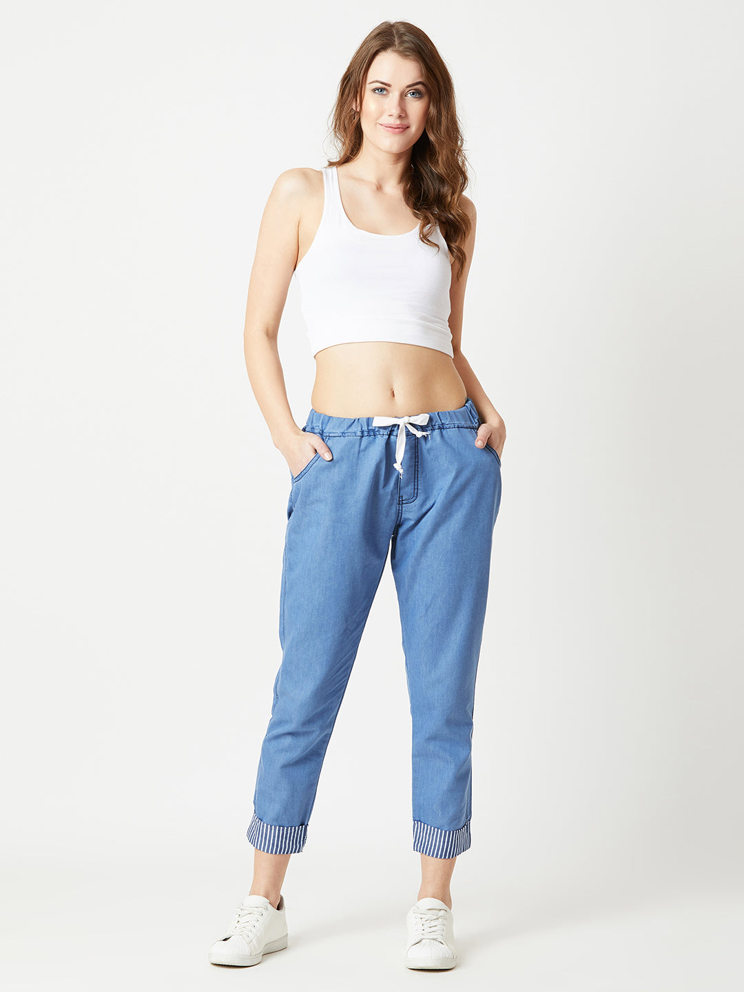 Women's Blue High Rise Clean Look Solid Cropped Striped Detailing Denim Joggers