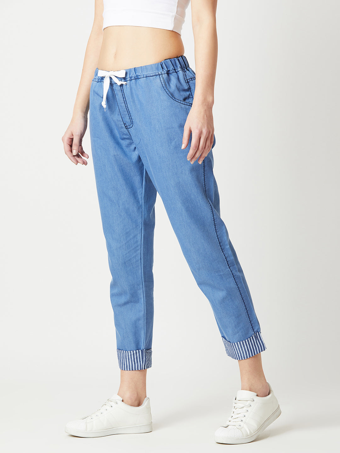 Women's Blue High Rise Clean Look Solid Cropped Striped Detailing Denim Joggers