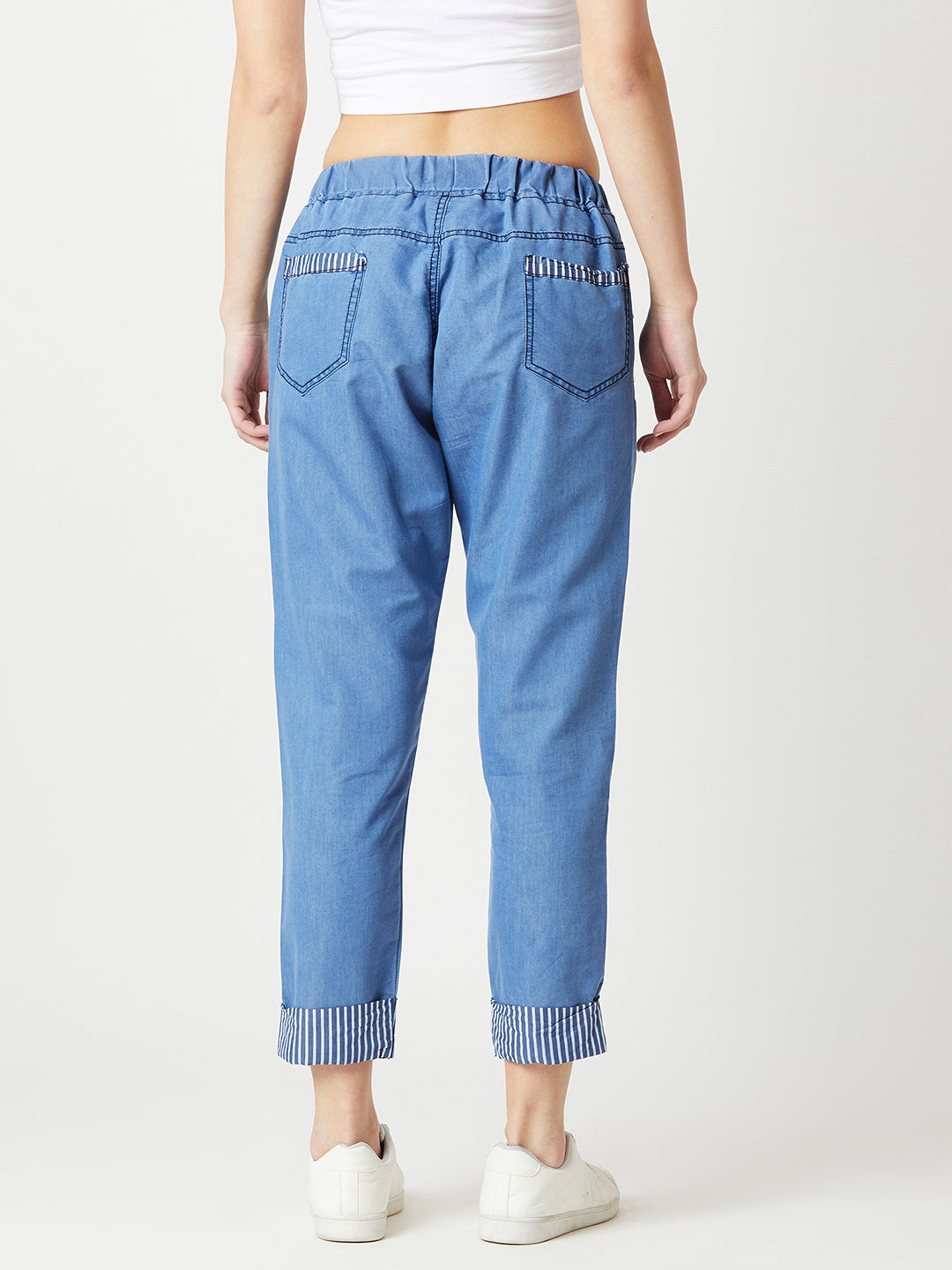 Women's Blue High Rise Clean Look Solid Cropped Striped Detailing Denim Joggers